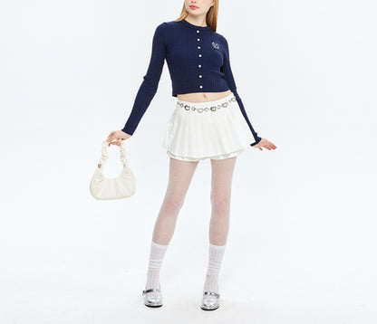 Long-sleeve Cropped Sweater with Embroidered Emblem and Tie-back Design