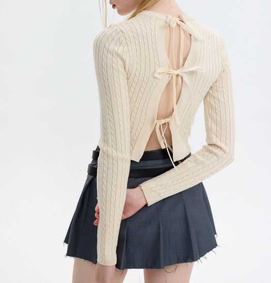 Long-sleeve Cropped Sweater with Embroidered Emblem and Tie-back Design